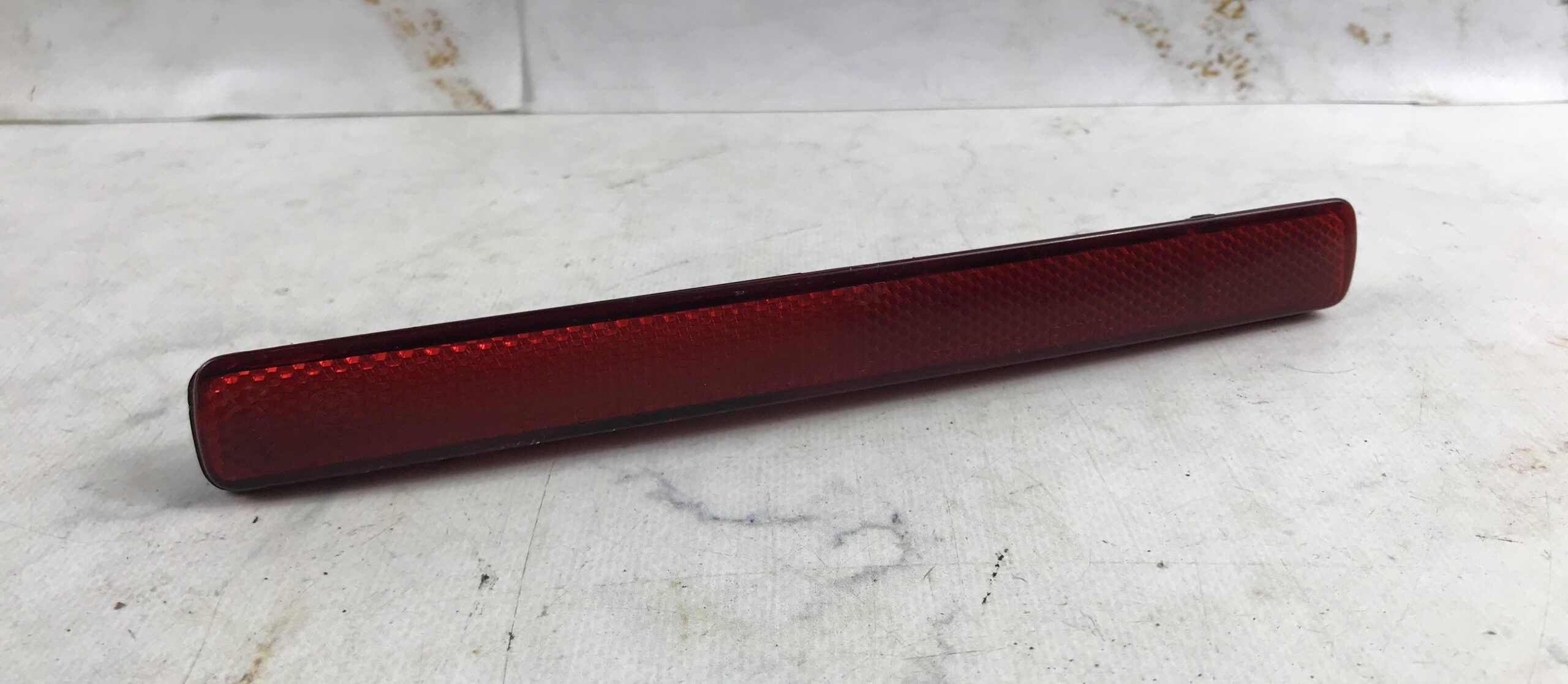 Отражатель в задний бампер левый для сангёнг кайрен 17401148 (1)