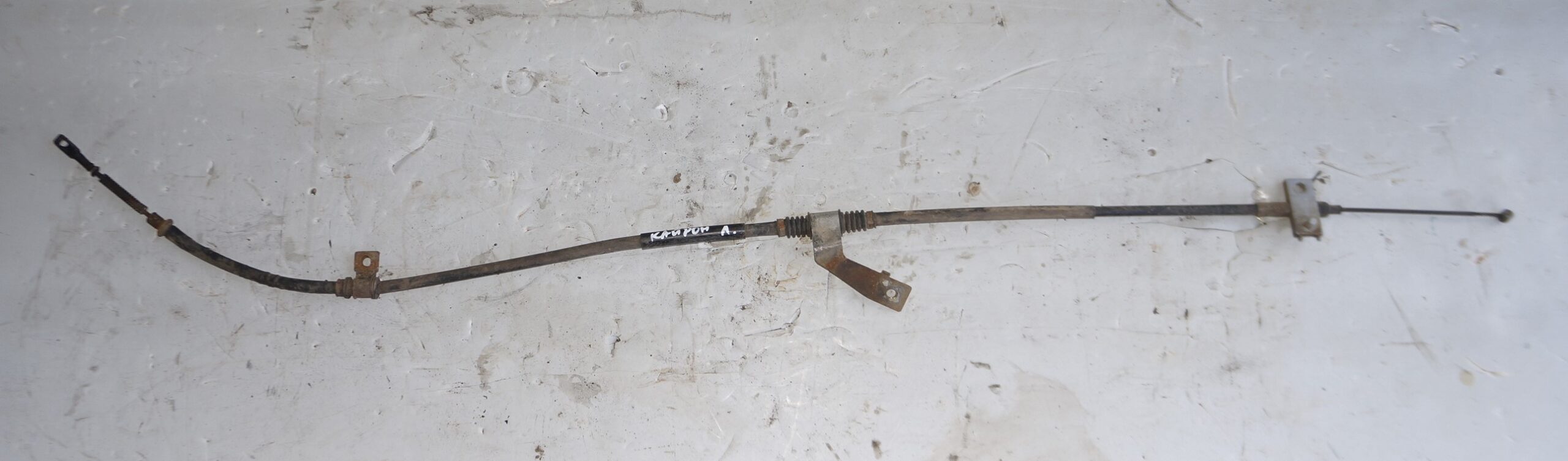 Трос ручника левый для сангёнг кайрен 17401233 (1)